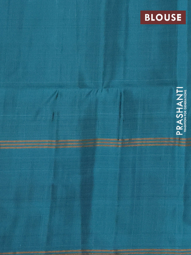 Pure soft silk saree black and teal blue with allover zari weaves and rettapet zari woven border