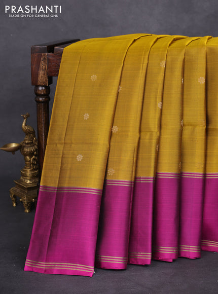 Pure soft silk saree dark mustard and purple with zari woven floral buttas and rettapet zari woven border