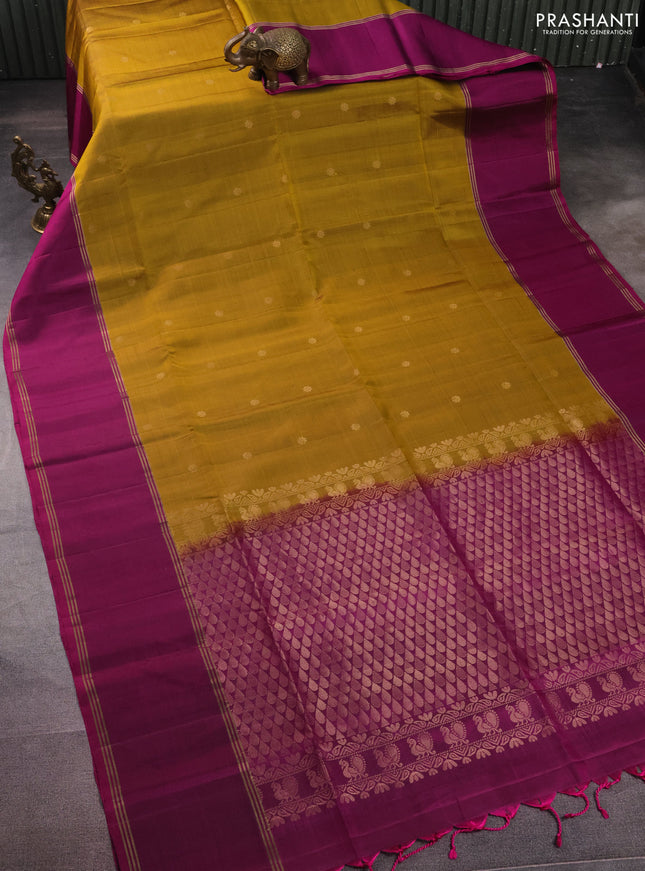 Pure soft silk saree dark mustard and purple with zari woven floral buttas and rettapet zari woven border