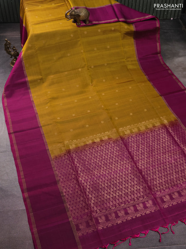 Pure soft silk saree dark mustard and purple with zari woven floral buttas and rettapet zari woven border