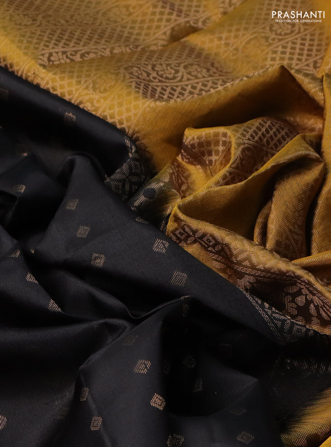 Pure soft silk saree black and dark mustard with allover zari woven buttas and long rettapet zari woven border