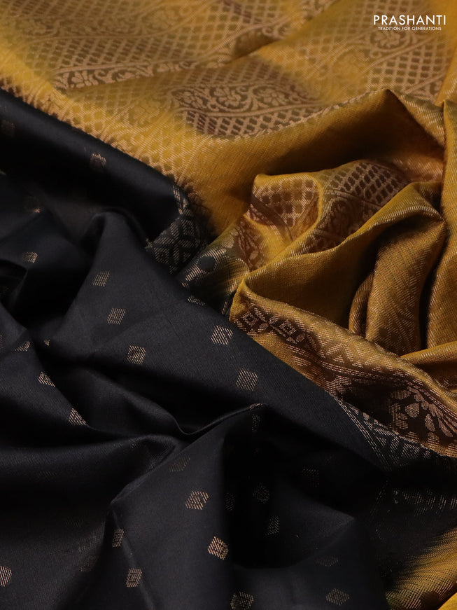 Pure soft silk saree black and dark mustard with allover zari woven buttas and long rettapet zari woven border