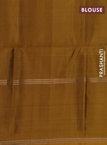 Pure soft silk saree black and dark mustard with allover zari woven buttas and long rettapet zari woven border