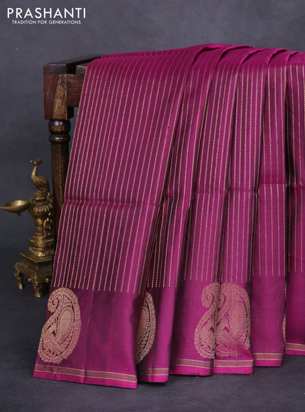 Pure soft silk saree purple with allover zari weaves and paisley zari woven butta border