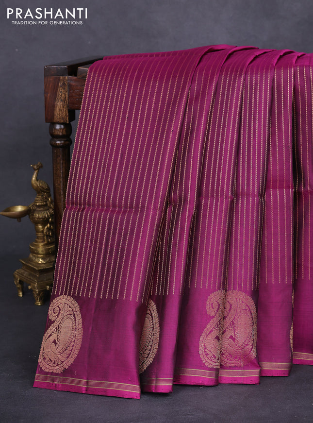 Pure soft silk saree purple with allover zari weaves and paisley zari woven butta border