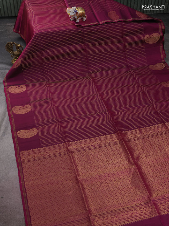 Pure soft silk saree purple with allover zari weaves and paisley zari woven butta border