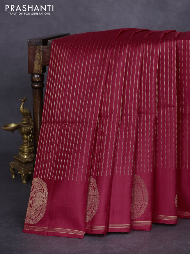 Pure soft silk saree red with allover zari weaves and paisley zari woven butta border