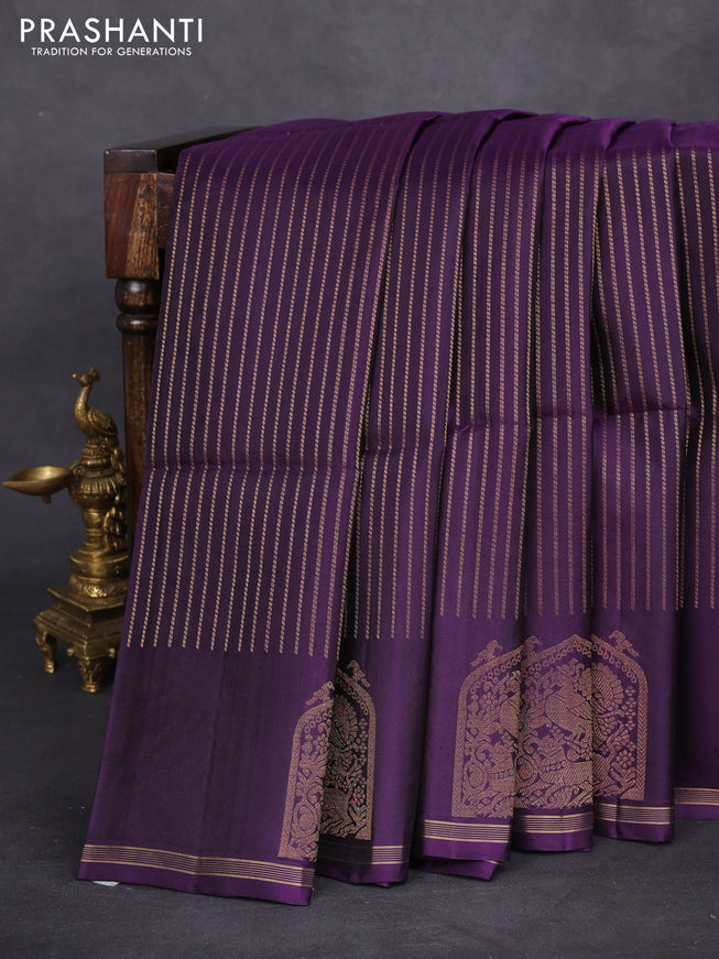 Pure soft silk saree violet with allover zari weaves and zari woven butta border