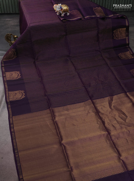 Pure soft silk saree violet with allover zari weaves and zari woven butta border