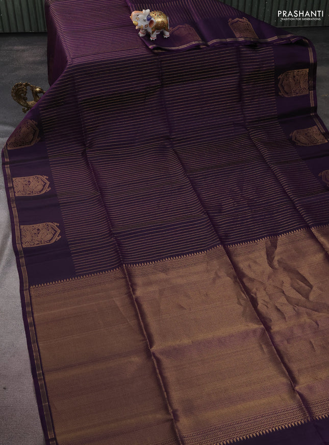 Pure soft silk saree violet with allover zari weaves and zari woven butta border
