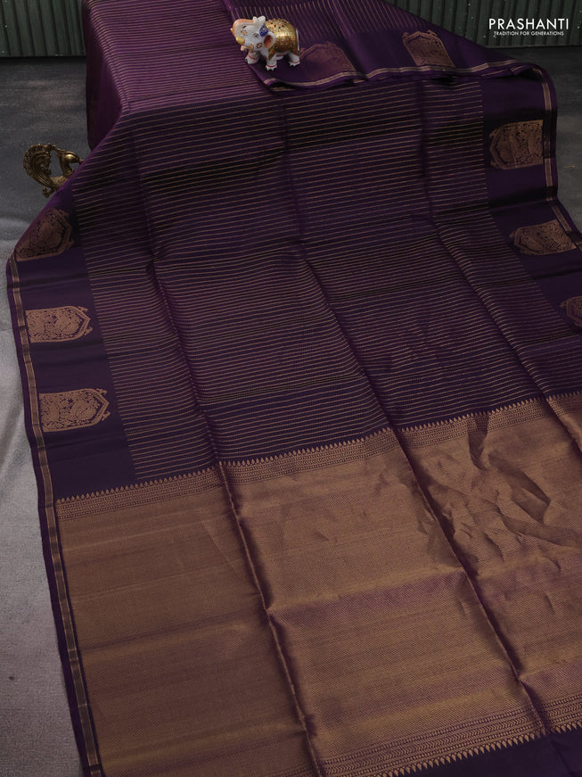 Pure soft silk saree violet with allover zari weaves and zari woven butta border