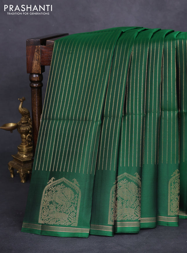 Pure soft silk saree green with allover zari weaves and zari woven butta border