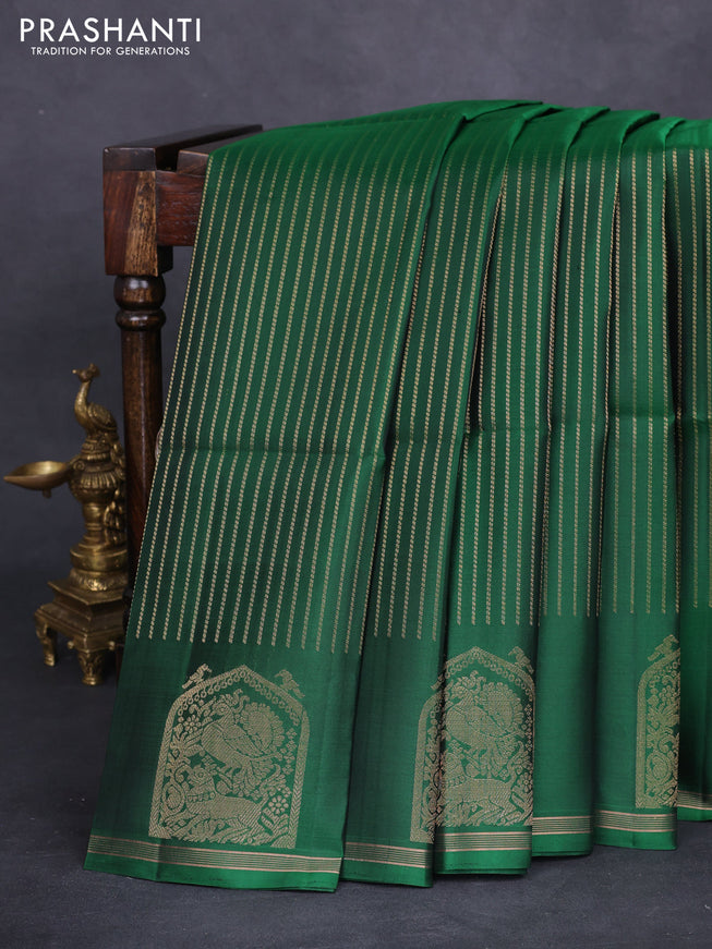 Pure soft silk saree green with allover zari weaves and zari woven butta border