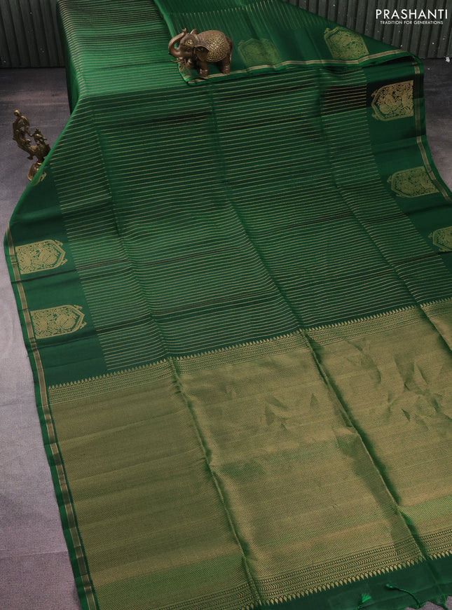 Pure soft silk saree green with allover zari weaves and zari woven butta border