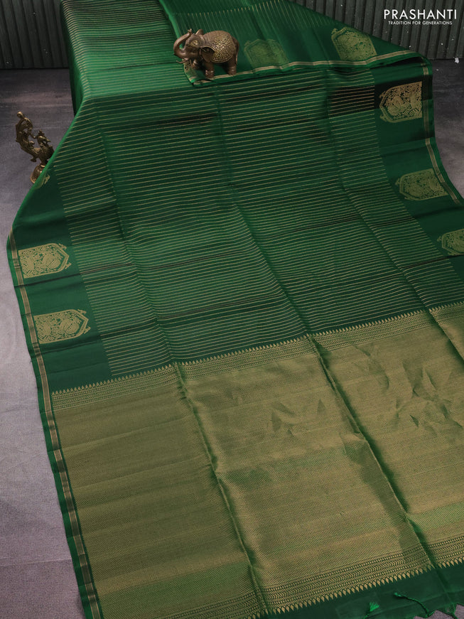Pure soft silk saree green with allover zari weaves and zari woven butta border