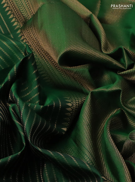 Pure soft silk saree green with allover zari weaves and zari woven butta border
