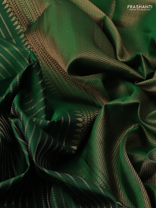Pure soft silk saree green with allover zari weaves and zari woven butta border
