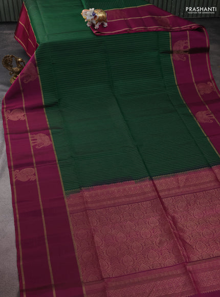 Pure soft silk saree green and purple with allover zari stripe pattern and long zari woven butta border