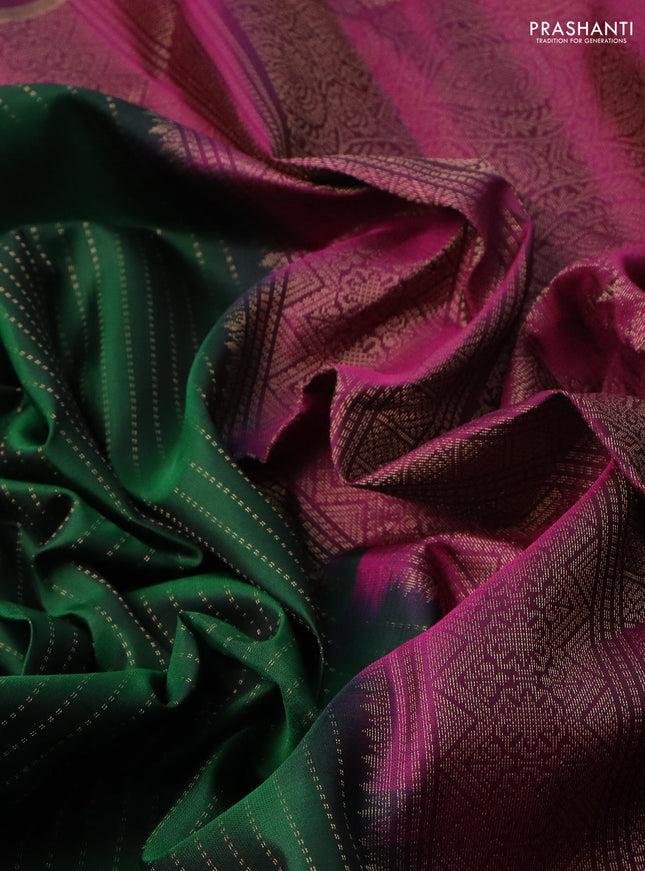 Pure soft silk saree green and purple with allover zari stripe pattern and long zari woven butta border