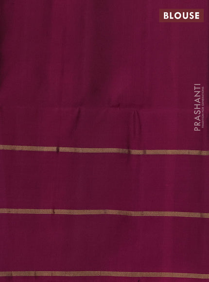 Pure soft silk saree green and purple with allover zari stripe pattern and long zari woven butta border