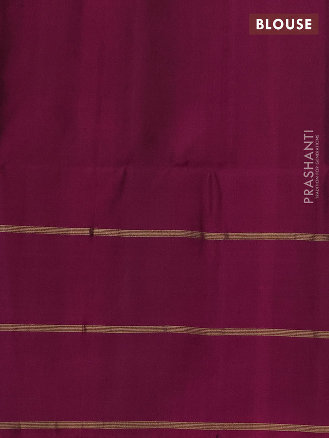 Pure soft silk saree green and purple with allover zari stripe pattern and long zari woven butta border