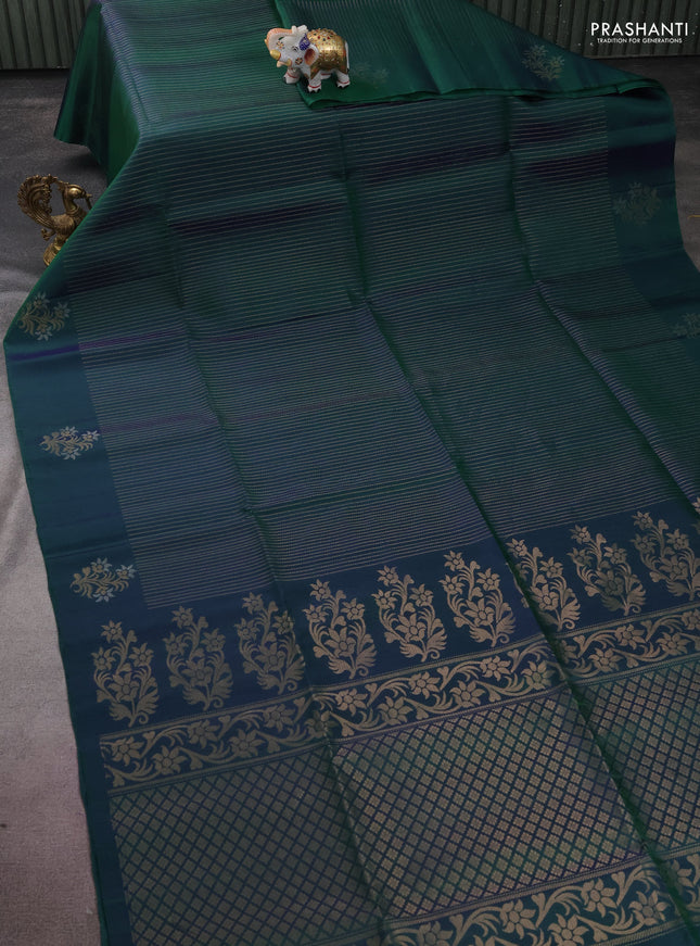 Pure soft silk saree dual shade of bluish green with allover zari weaves and zari woven floral butta border
