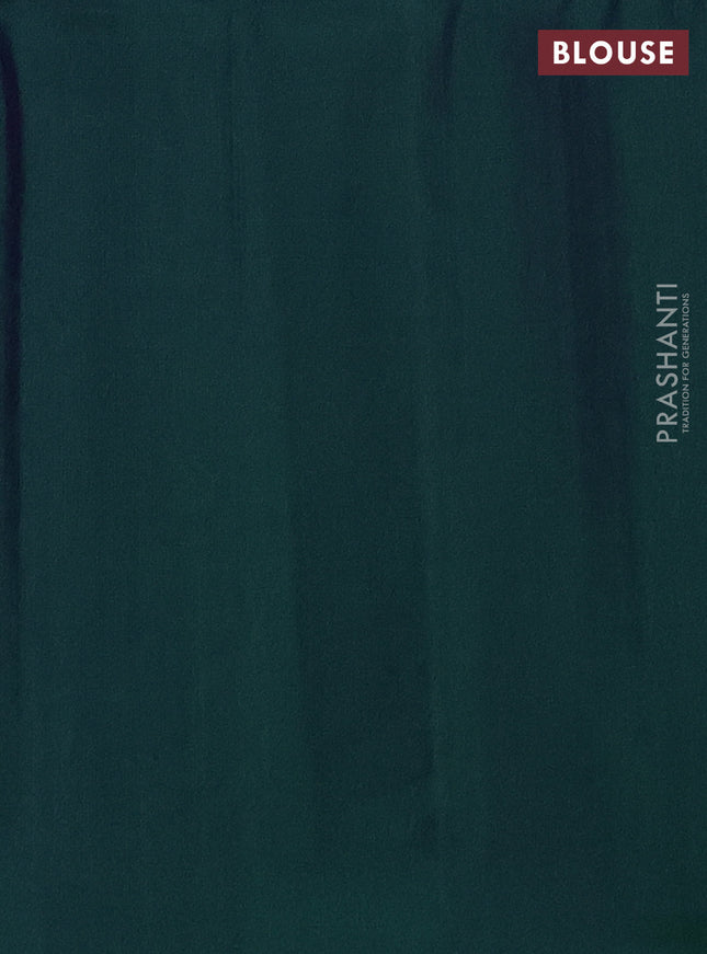 Pure soft silk saree dual shade of bluish green with allover zari weaves and zari woven floral butta border