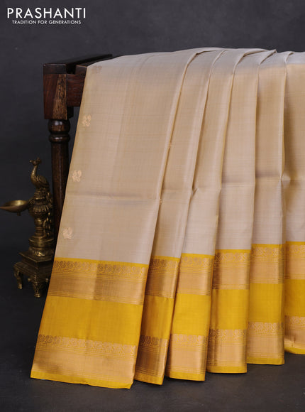 Pure soft silk saree beige with zari woven buttas and rettapet zari woven border