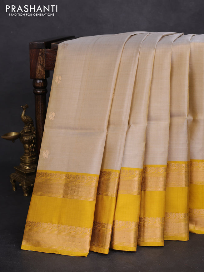 Pure soft silk saree beige with zari woven buttas and rettapet zari woven border