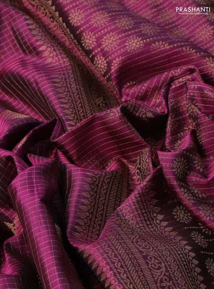Pure soft silk saree purple with allover zari checks & buttas and rettapet zari woven border