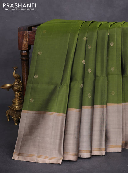 Pure soft silk saree sap green and grey shade with zari woven buttas and rettapet zari woven border
