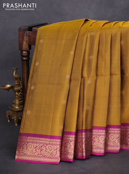 Pure soft silk saree dark mustard and purple with zari woven buttas and zari woven border