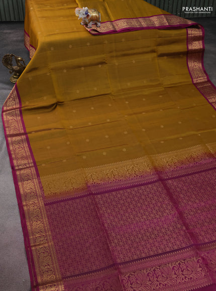 Pure soft silk saree dark mustard and purple with zari woven buttas and zari woven border