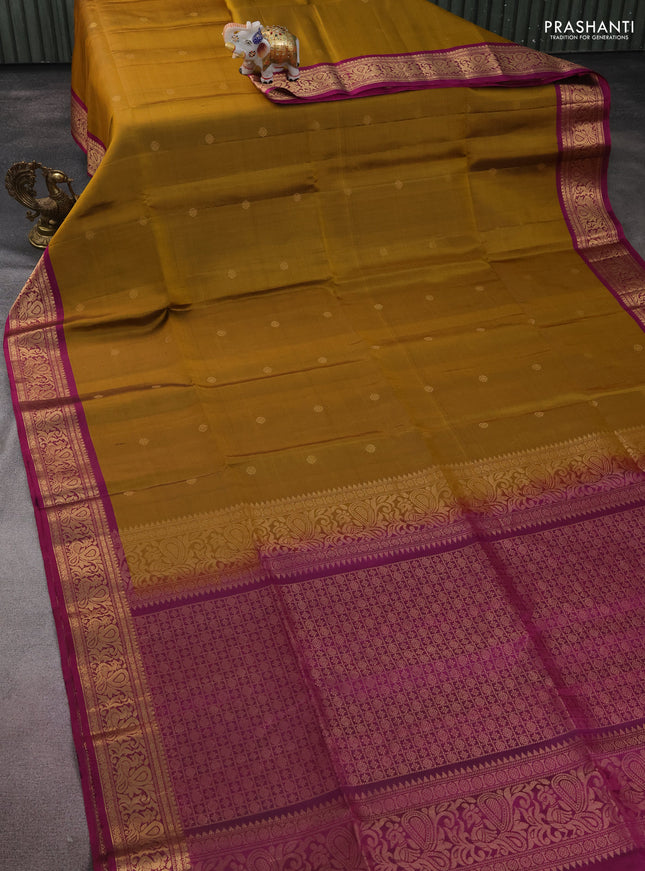 Pure soft silk saree dark mustard and purple with zari woven buttas and zari woven border