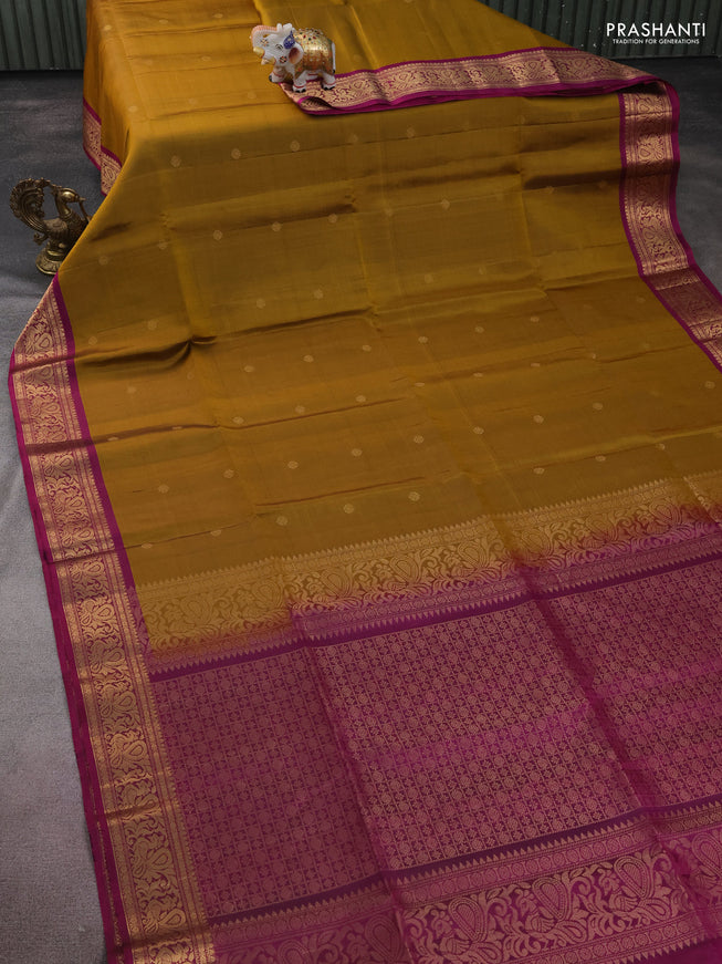 Pure soft silk saree dark mustard and purple with zari woven buttas and zari woven border
