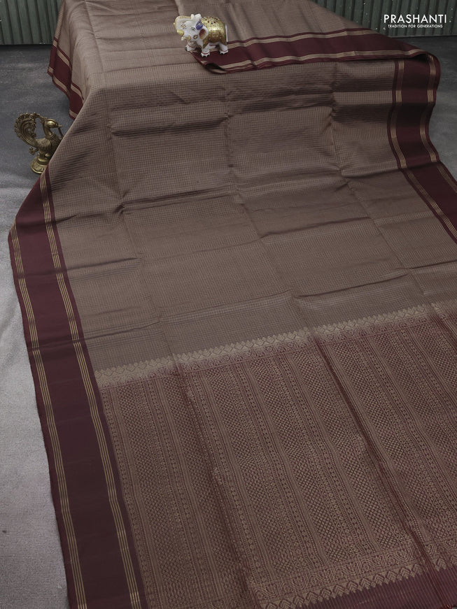 Pure soft silk saree pastel brown and deep maroon wth allover zari checked pattern and rettapet zari woven border