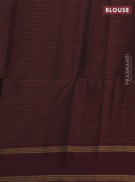 Pure soft silk saree rust shade and deep maroon wth allover zari checked pattern and rettapet zari woven border