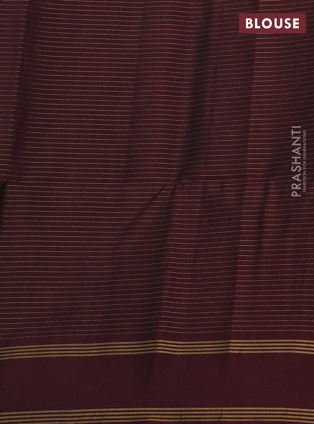 Pure soft silk saree rust shade and deep maroon wth allover zari checked pattern and rettapet zari woven border