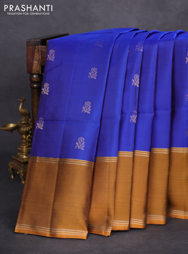 Pure soft silk saree royal blue and dark mustard with floral zari woven buttas and rettapet zari woven border
