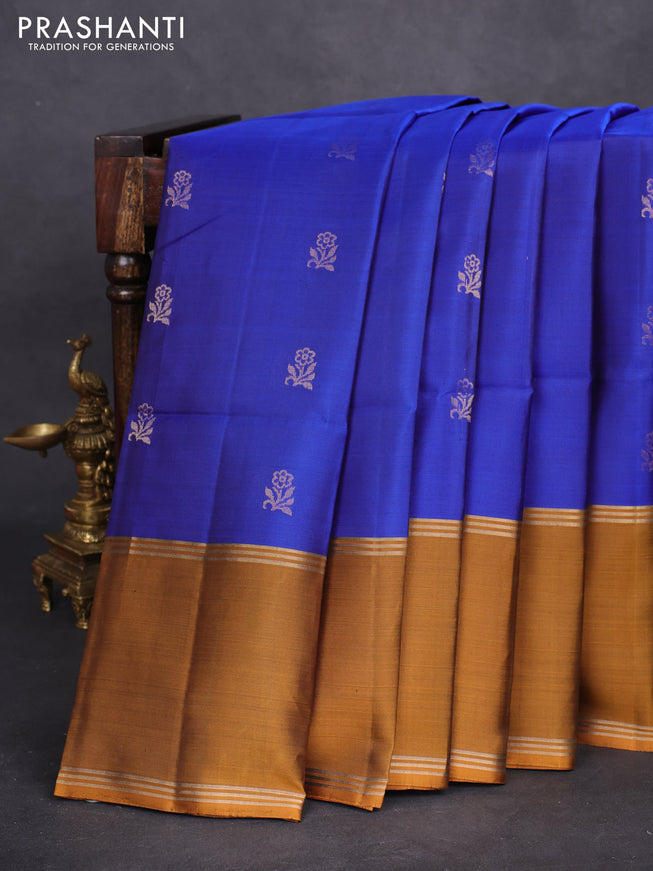 Pure soft silk saree royal blue and dark mustard with floral zari woven buttas and rettapet zari woven border