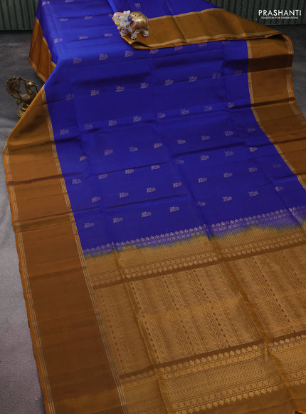 Pure soft silk saree royal blue and dark mustard with floral zari woven buttas and rettapet zari woven border