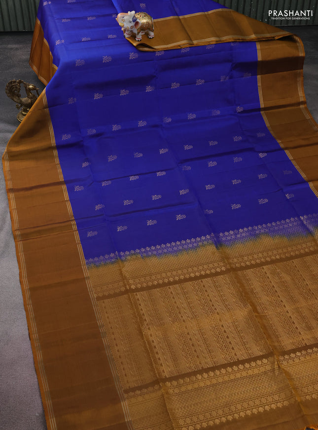Pure soft silk saree royal blue and dark mustard with floral zari woven buttas and rettapet zari woven border