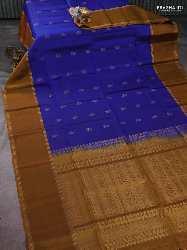 Pure soft silk saree royal blue and dark mustard with floral zari woven buttas and rettapet zari woven border
