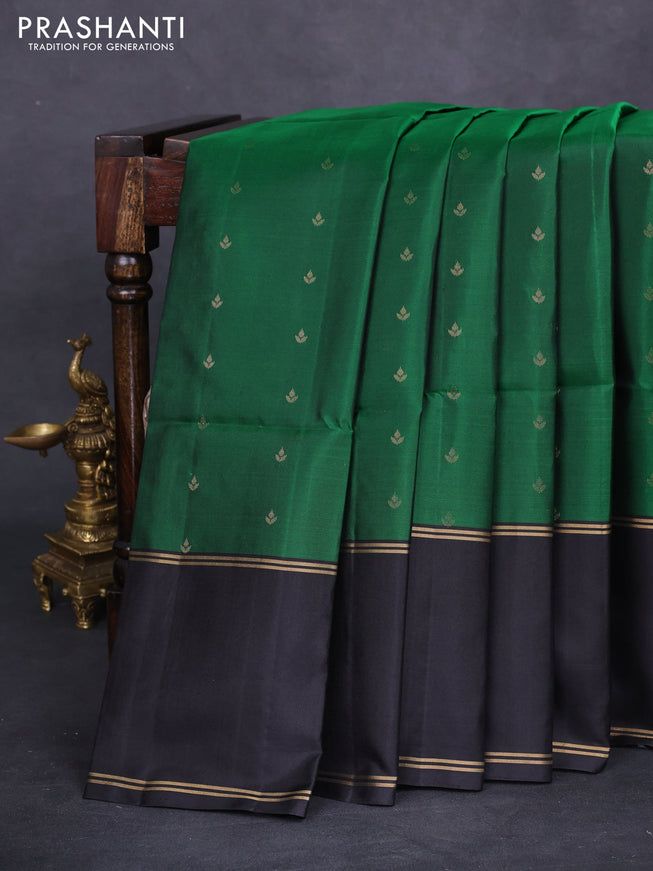 Pure soft silk saree green and black with allover zari woven buttas and rettapet zari woven border