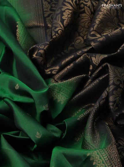 Pure soft silk saree green and black with allover zari woven buttas and rettapet zari woven border