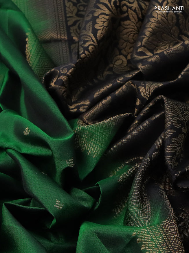 Pure soft silk saree green and black with allover zari woven buttas and rettapet zari woven border