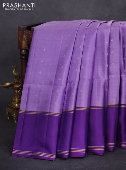Pure soft silk saree lavender shade and purple with allover zari woven buttas and rettapet zari woven border