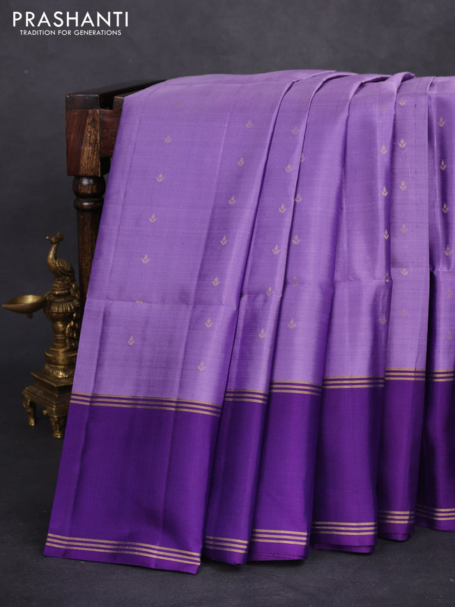 Pure soft silk saree lavender shade and purple with allover zari woven buttas and rettapet zari woven border