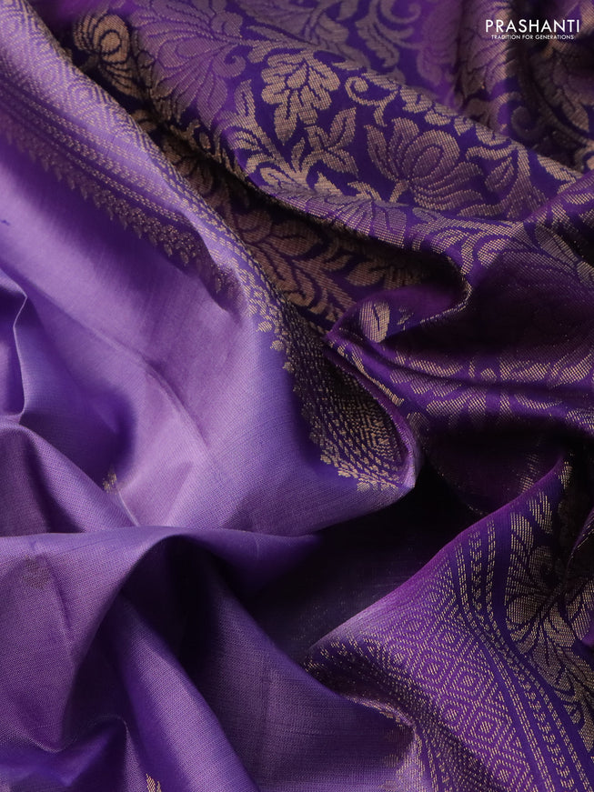 Pure soft silk saree lavender shade and purple with allover zari woven buttas and rettapet zari woven border
