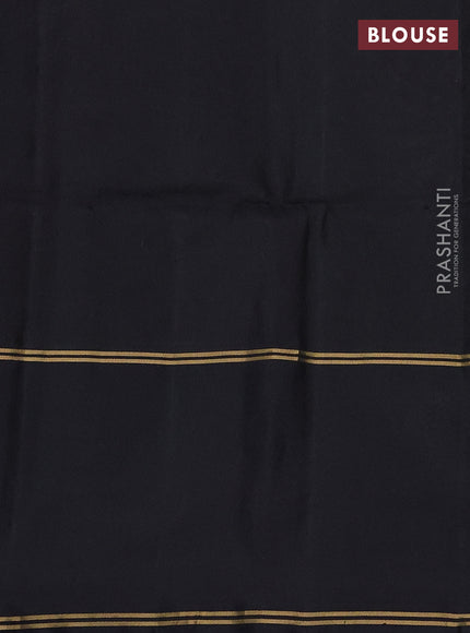 Pure soft silk saree light green and black with allover zari woven buttas and rettapet zari woven border